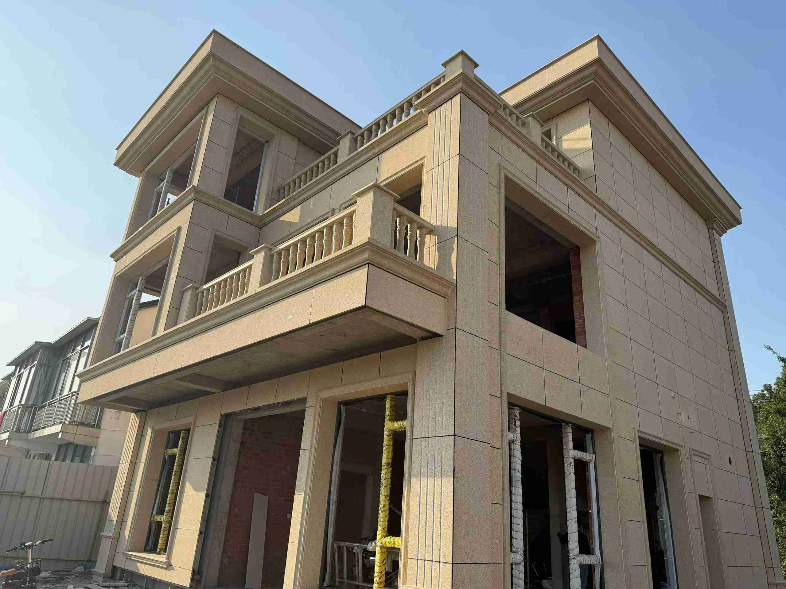 宿州 黄金麻花岗岩石材荔枝面外墙干挂效果展示